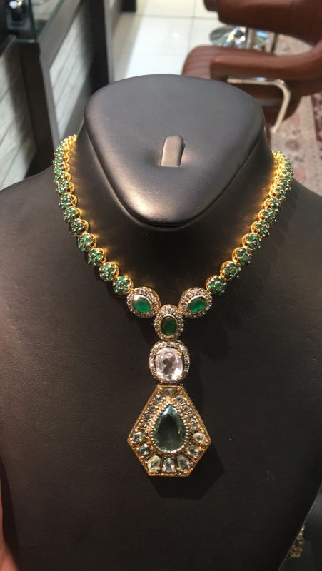 Alt Text: Zabardast 925 silver gold plated emerald necklace with pendant design aur sparkling diamonds, best bridal jewelry in Karachi – shop online affordable emerald necklaces Pakistan for
