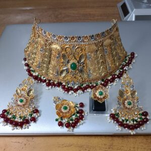 Silver 925 bridal jewellery set by Zuha Jewellery Karachi&mdash;includes gold-plated choker, earrings, ring, and maang tikka with emerald, ruby, and pearl accents. Best for brides in Karachi.