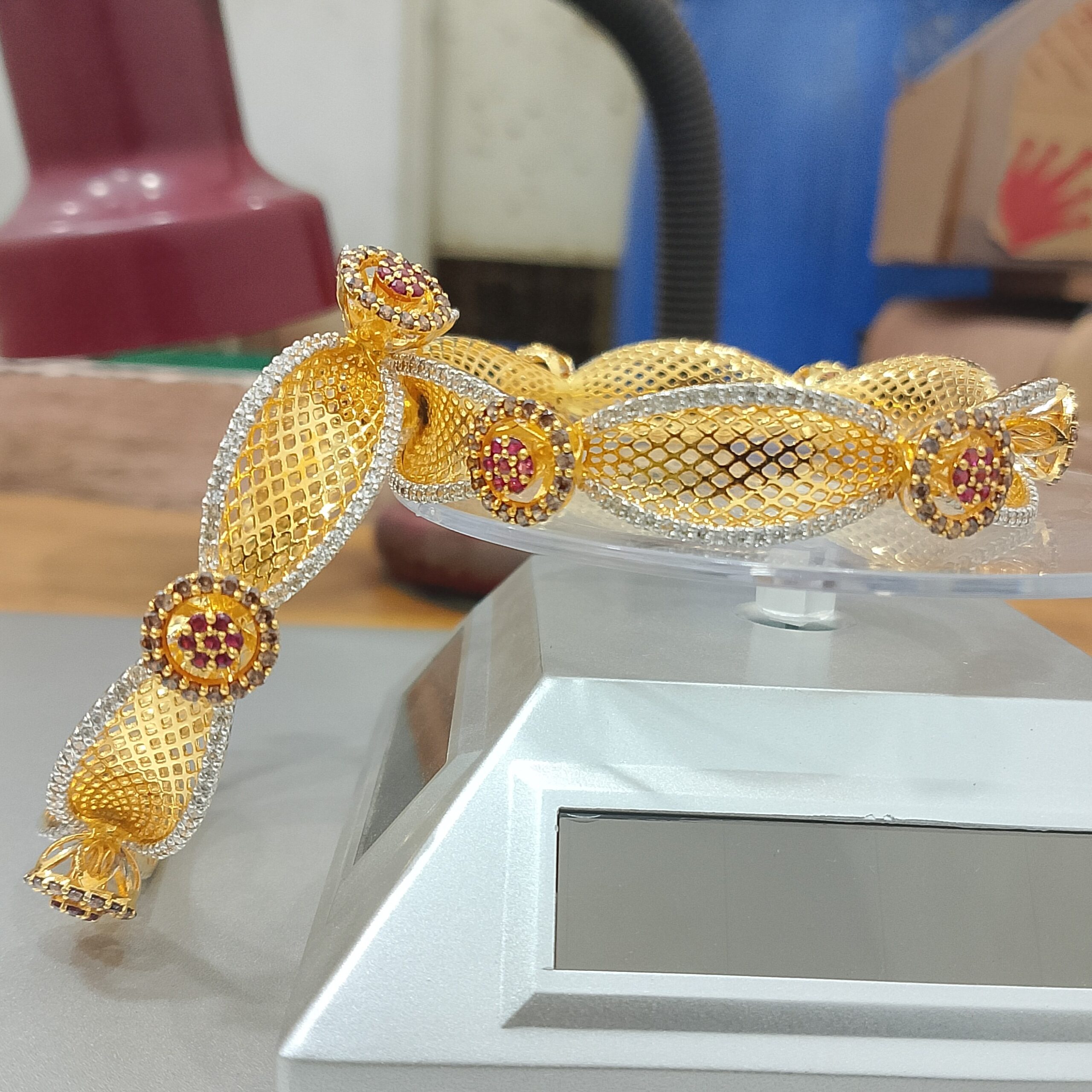 "Ruby Mesh Gold Plated Bangles Set – CZ Diamond Accents Zuha Jewellery2 scaled 925 silver jewelry Karachi". Ruby Mesh Gold Plated Bangles Set – CZ Diamond Accents