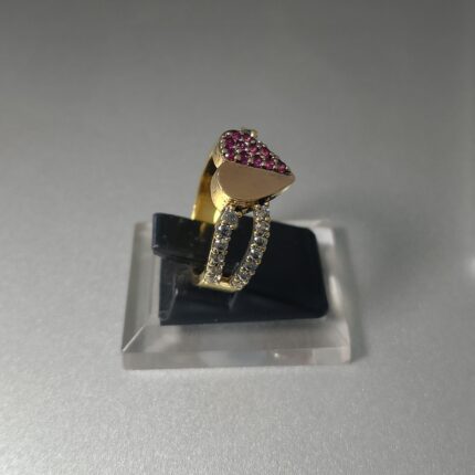 This is a Le Vian GODIVA x Le Vian® Passion Ruby and Chocolate Diamond heart ring in gold plated.