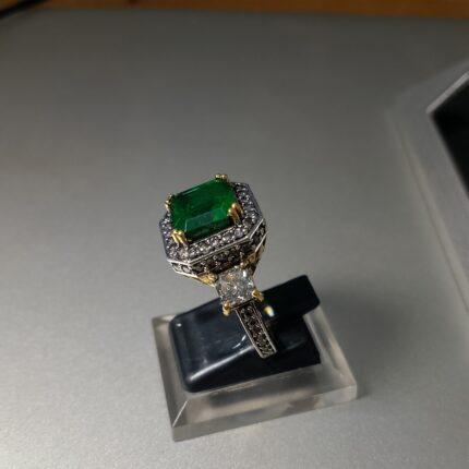 Cut Emerald And Diamond Three-stone Ring With A Two-tone Setting