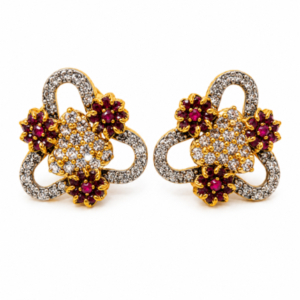 Antique gold plated maroon floral trinity pendant set with matching earrings and CZ stones Antique gold plated maroon floral trinity pendant set with matching earrings and CZ stones