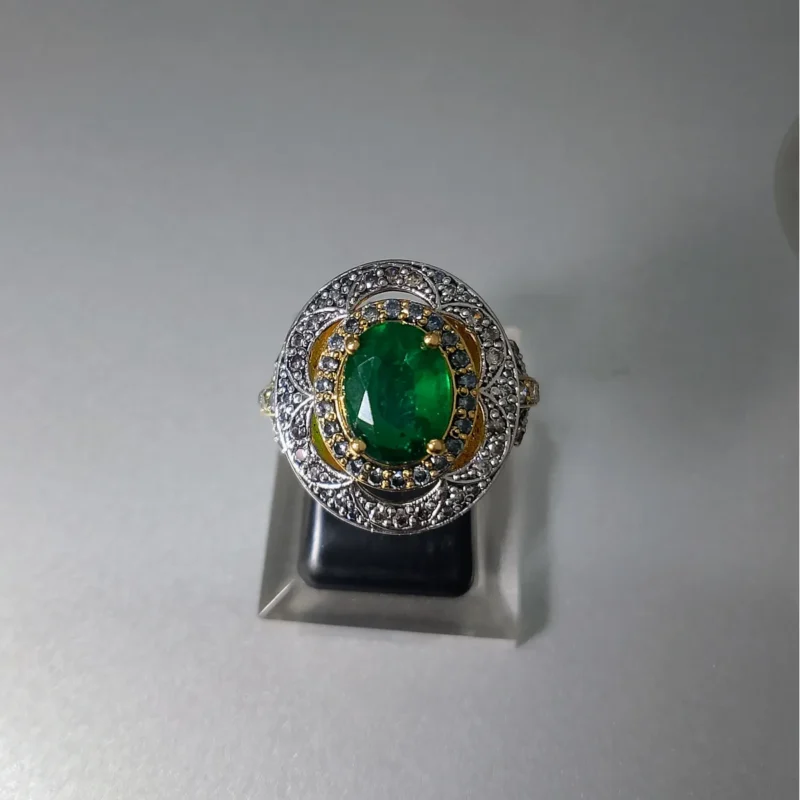 The Aura Green Emerald Ring in 925 Sterling Silver with emerald centre